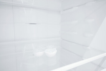 An empty refrigerator. Inside an empty, clean refrigerator, a refrigerator compartment after...