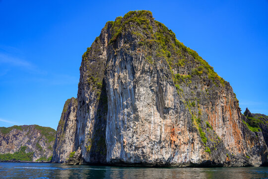 Sea cliffs on Koh Phi Phi Ley island in the Andaman Sea, Krabi Province, Thailand
