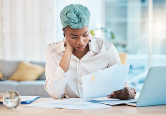 Reading, serious and black woman with accounting paperwork, company budget and tax work. Confused, freelance and remote African corporate accountant with documents for financial or investment report