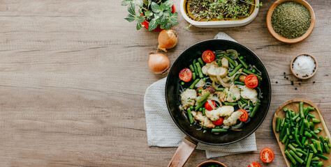 Sliced hericium erinaceus mushrooms in a frying pan