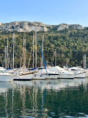 Fototapeta na wymiar View of the sea and yachts on the summer day. Cagliari. Sardinia. Italy.