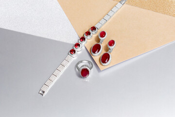 Elegant jewelry set. Jewellery set with gemstones. Jewelry accessories collage. Product still life...