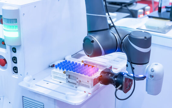 Robot arm with test tube for biological experiments in laboratory