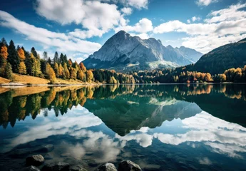 Gordijnen A serene mountain landscape with a reflective lake, surrounded by picturesque mountains and trees, illustrating nature's serene beauty. High quality photo © oksa_studio