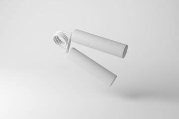 White hand strengthener floating in mid air on white background in monochrome and minimalism. Illustration of the concept of hand therapy and improvement of finger strength and dexterity