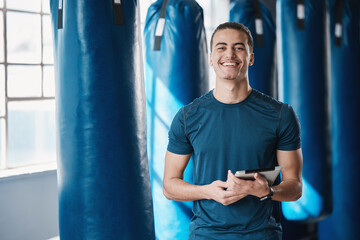 Fitness, man and gym coach with tablet ready for exercise class and training with a smile. Young...