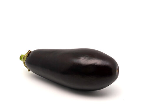 One fresh and ripe eggplant isolated on white background with copy space.
