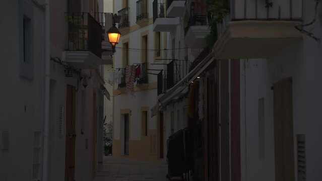 Street scene and Sant Salvador de la Marina church in Dalt Vila old town, UNESCO World Heritage Site, Ibiza Town, Ibiza, Balearic Islands, Spain
