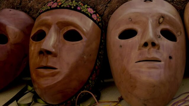 close-up shot wooden masks typical of the sardinia region in italy