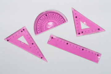 Set of transparent rulers on color backgroung, top view