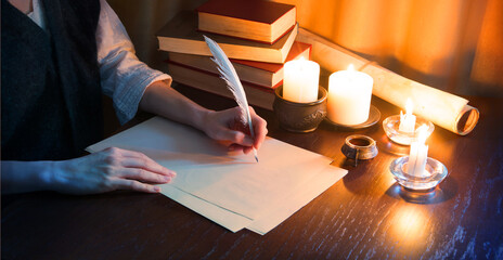Girl writes a letter with a pen on paper