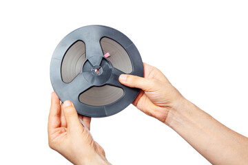 Hands holding reel of tape on white background..