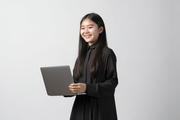 Portrait of a young asian woman using laptop computer on white background, Generative AI