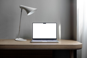 laptop on the table with space for a signature. copy space. Macbook 14 pro 2021. gray wall,...
