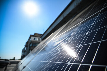 Fototapeta na wymiar Green energy, solar panels on the roof of the house