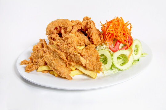 Chicharron fish with vegetable salad, delicious Peruvian food