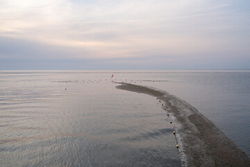 Fishing net, a fish-trap in the sea, summer steady low water level.
