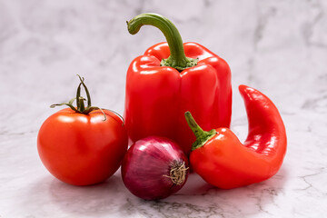 Bell peppers and tomatoes isolated close-up