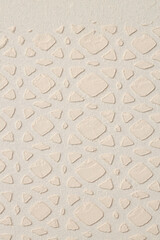Abstract beige and white color acrylic relief stucco wall painting. Canvas modeling clay texture background.