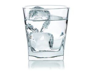Glass of water with ice cubes. Cold water good for dehydration in the summer. Frozen water in shape of cube. Natural or real ice cubes for alcohol drink, cocktails, vodka. Isolated white background.