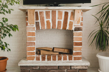 homemade red brick fireplace in the living room.