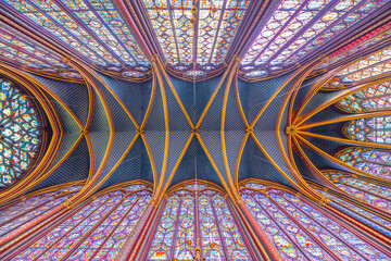 Monumental interior of Sainte-Chapelle with stained glass windows, upper level of royal chapel in the Gothic style. Palais de la Cite, Paris, France