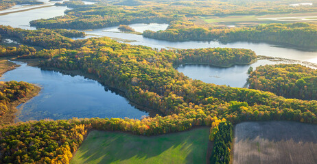 Aerial view of the Mississippi River and farm fields in northern Minnesota on a bright autumn morning