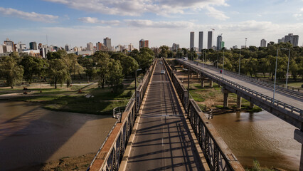 Fototapeta na wymiar City of Río IV, Córdoba, Argentina. Aerial view on drone of the bridge and the river.