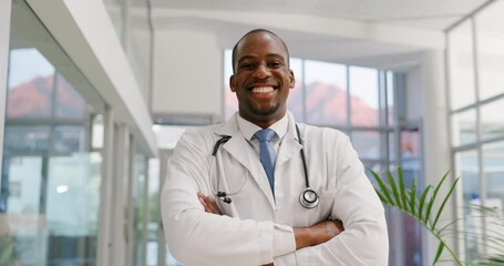 Face, doctor and black man smile with arms crossed in hospital for wellness. African medical professional, portrait and confident surgeon, healthcare worker and happy employee from Nigeria in clinic. - Powered by Adobe