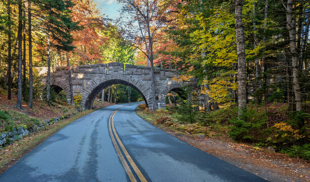 Historic stone bridge with autumn colors of Acadia National Park in Maine