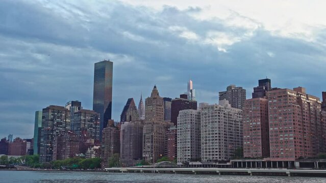 The Manhattan skyline rises over the East River