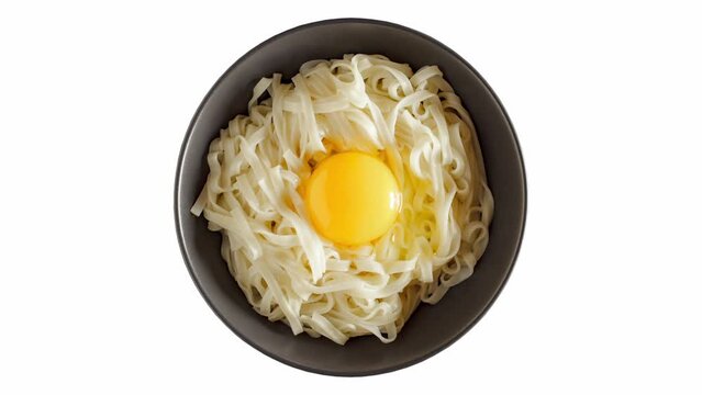 Udon noodles with raw egg, japanese ingredients, top view, rotating on white background, turning, looped video
