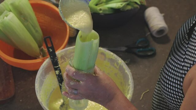 Recife, Pernambuco, Brazil. 07, 05, 2023. Video shows the preparation of Pamonha, a typical food made from corn that is served on the feasts of S&atilde;o Jo&atilde;o.