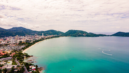 Aerial view of Patong beach city at sunset, view, beautiful place in Phuket, Thailand.