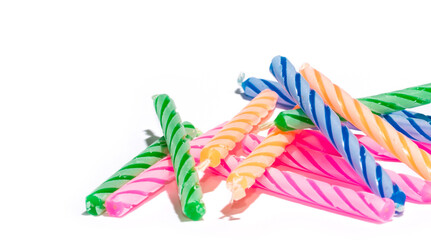 colorful birthday candles isolated on white, with copyspace for your work.
