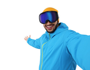 Smiling young man in ski goggles taking selfie on white background