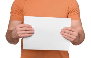 Man holding sheet of paper on light grey background, closeup. Mockup for design