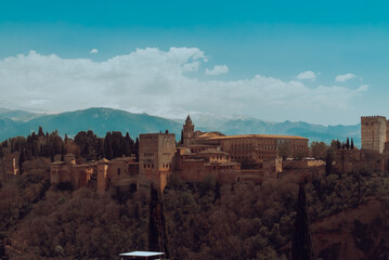 Granada,Spain. April 14, 2022: Alhambra castle panoramic landscape with blue sky.