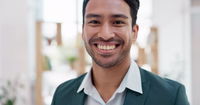 Laughing, face and an Asian man in an office for a corporate job, professional career and happy as lawyer. Smile, working and portrait of a businessman at an law agency or company firm for legal work