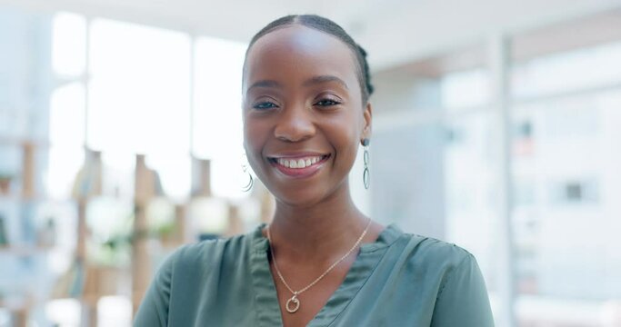 Face, funny or comedy with a business black woman laughing at a joke in an office for corporate work. Portrait, smile and comic with a happy young female employee standing in a professional workplace