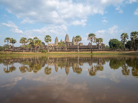 Siem Reap, Cambodia - 12/30/2019 : Angkor Wat Temple from pond view