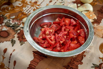 a small pieces of tomato in a container
