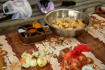 a masala box and chicken for cooking
