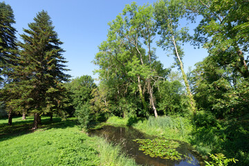 Fototapeta na wymiar Oeuf river in Estouy village. Centre-Val-De-Loire Region