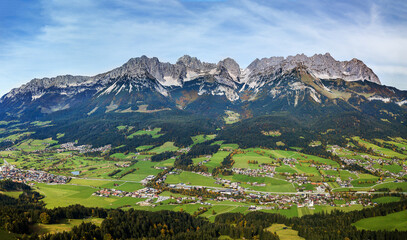 Panorama aerial image of valleys and the famous Wilder Kaiser mountain range, Kitzbuehel, Tyrol, Austria - obrazy, fototapety, plakaty