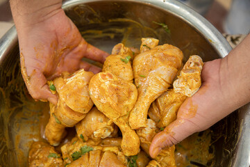 chicken leg piece in a container