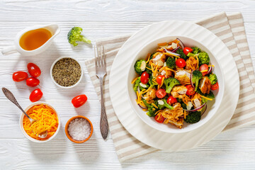 fried chicken tenders broccoli salad in bowl