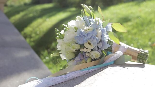 Bride's bouquet on her wedding day on the promenade