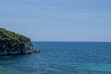 Fototapeta na wymiar Blue bay of the mediterranean sea Sun green nature blue water Rest vacation sea