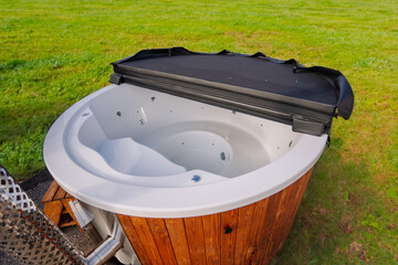 partially open lid for hot tub